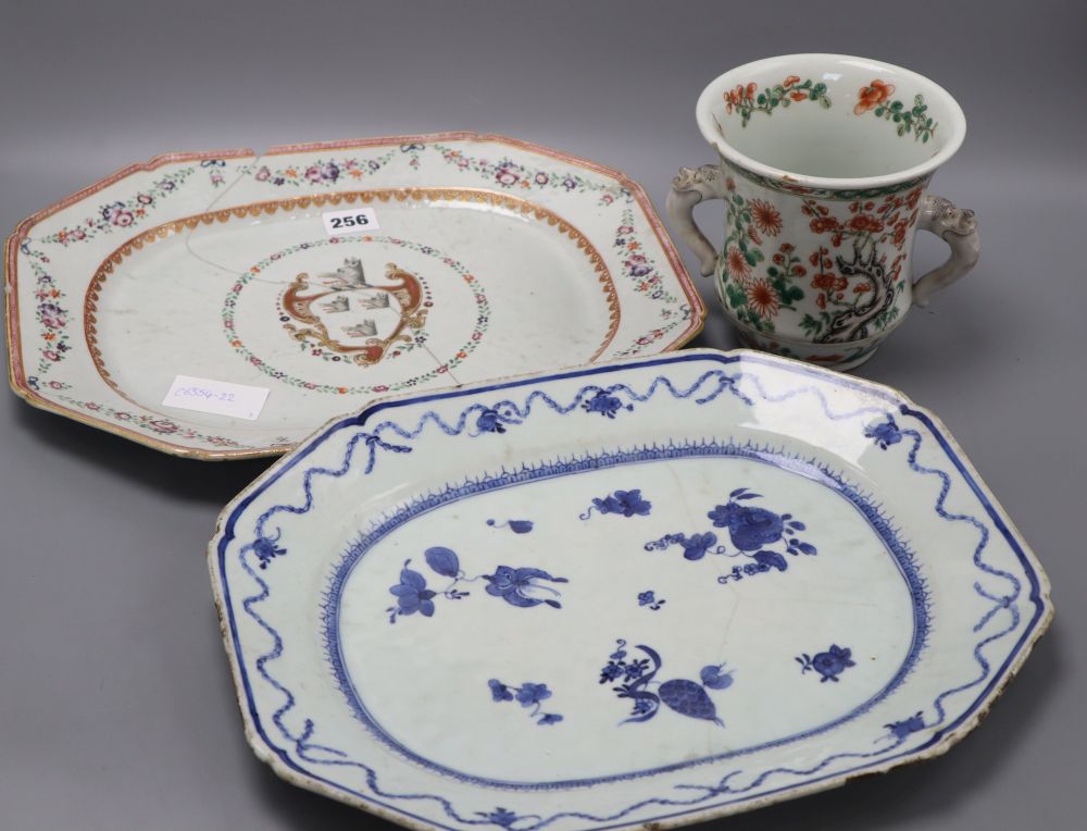 A Chinese two handled cup, height 14cm, a Qianlong blue and white dish and an armorial dish